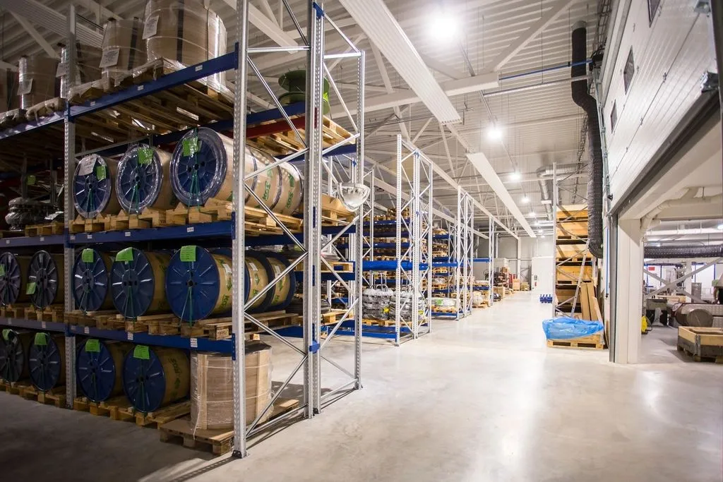 Long warehouse aisle with racking
